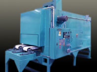 Conveyor oven for sterilizing surgical devices
