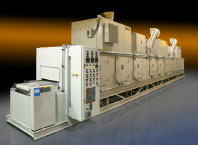 Custom conveyor oven for high-volume optical production