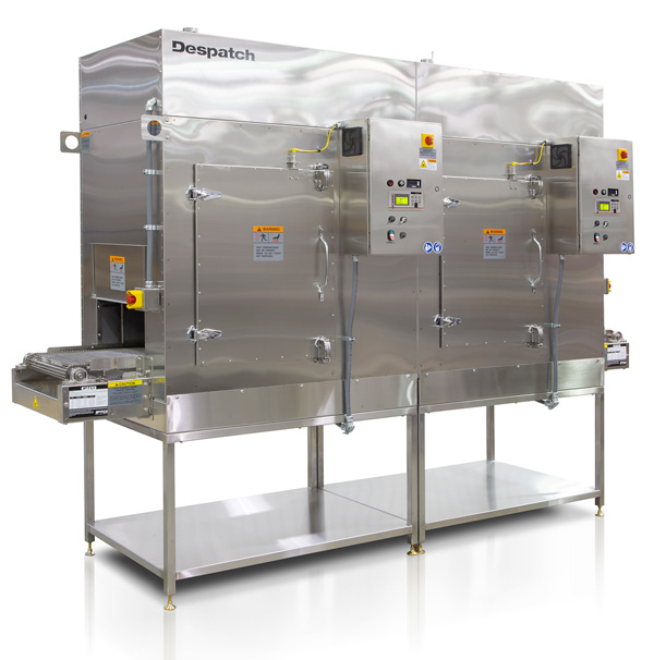 Despatch end-to-end conveyor oven for preheating medical device compression molds